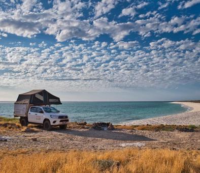 Camper beside beach